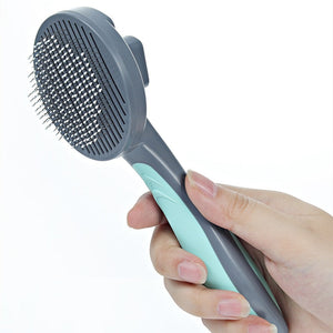 Brosse autonettoyante pour chats et chiens